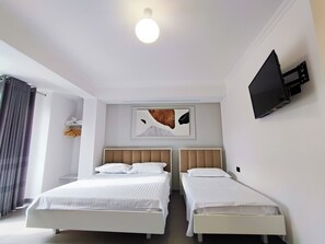 1 Schlafzimmer, BĂŒgeleisen/BĂŒgelbrett, WLAN, BettwĂ€sche