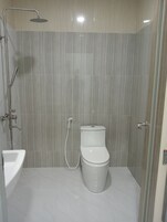 Habitación Deluxe | Baño | Zapatillas