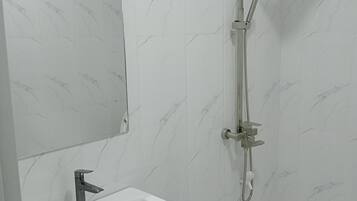 Deluxe Room | Bathroom | Slippers