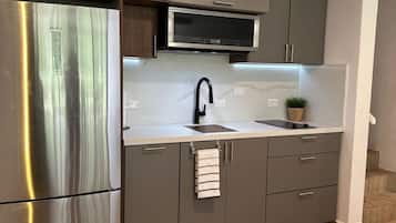 Fridge, microwave, stovetop, coffee/tea maker