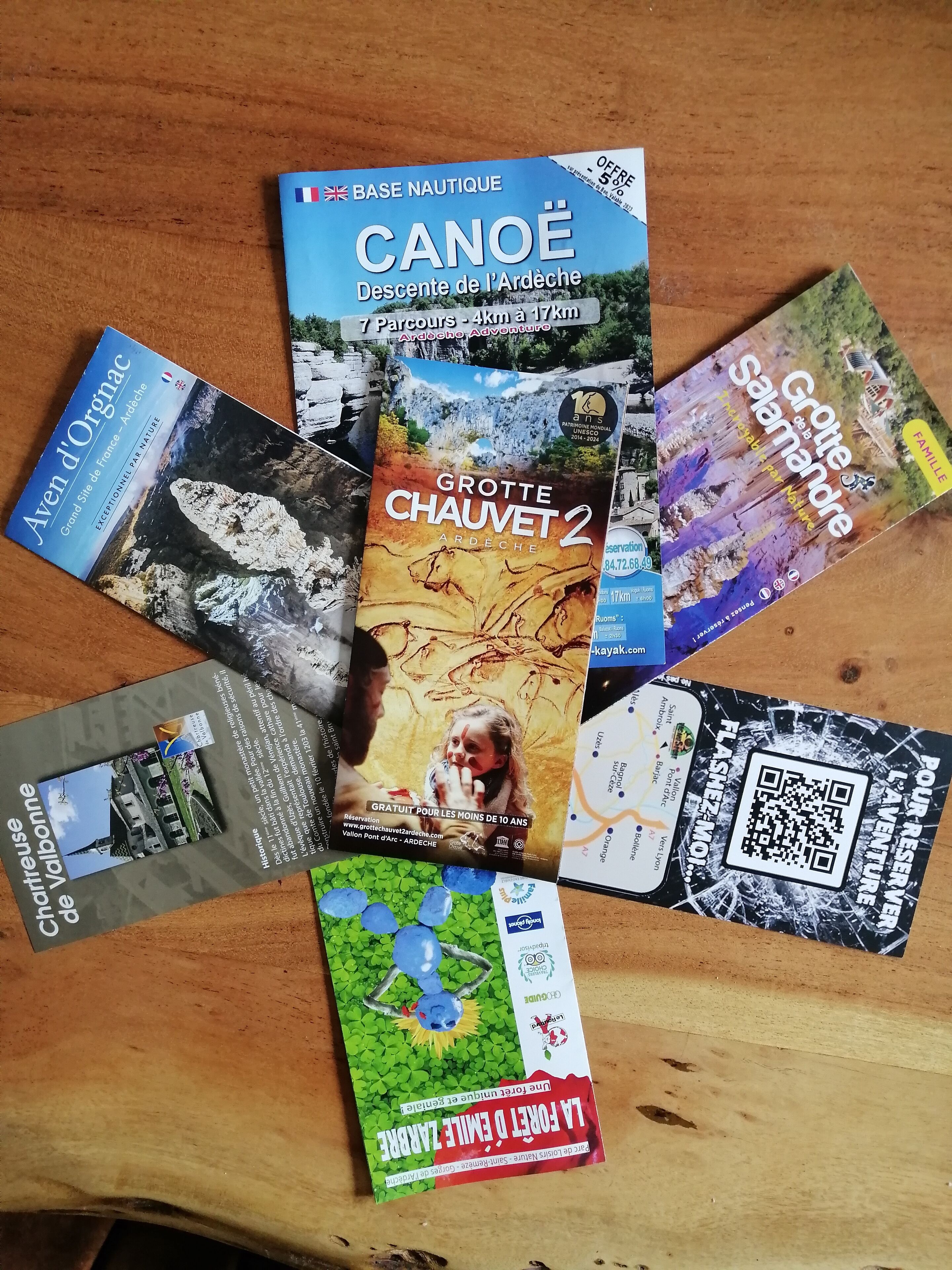 A collection of brochures for various outdoor activities and destinations.