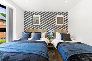 2 chambres, fer et planche à repasser, Wi-Fi, draps fournis