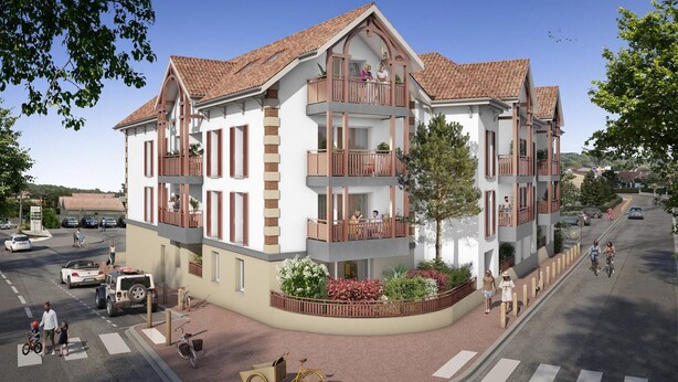 Ein mehrgeschossiges Wohnhaus mit Balkonen, einem Fußweg und einem Fahrrad.