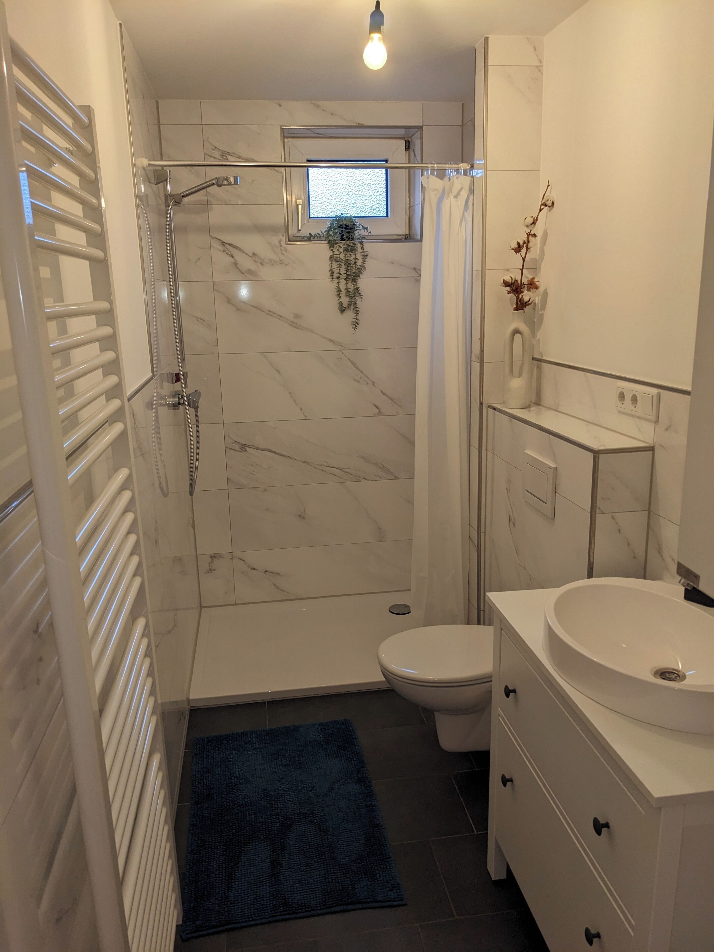 Shower, eco-friendly toiletries, hair dryer, towels