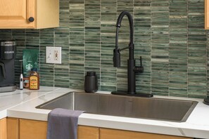 Fridge, microwave, oven, stovetop - Modern, Luxury, Centrally-Located Home with Hot Tub, Sauna, Gym. Pet-Friendly. (Arvada)