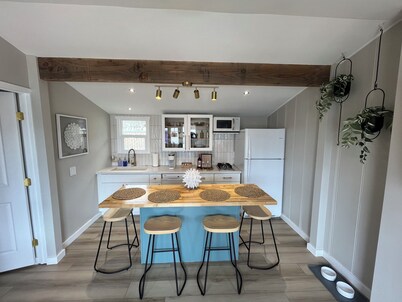 Upscale Beach Cottage - rock view - paddleboards