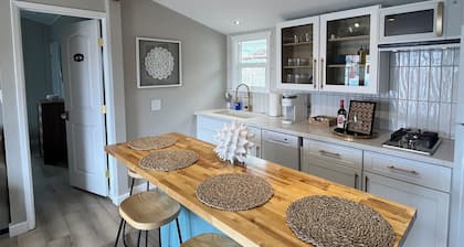 Upscale Beach Cottage - rock view - paddleboards