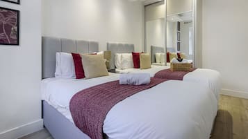 Economy Apartment, 1 Bedroom, Private Bathroom | 1 bedroom, iron/ironing board, free WiFi, bed sheets