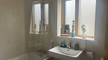 Hair dryer, towels, soap, shampoo