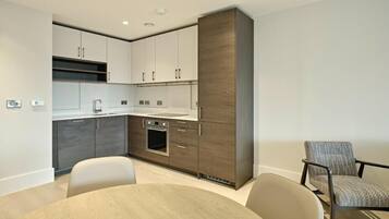 Apartment | Private kitchen | Fridge, microwave, oven, stovetop