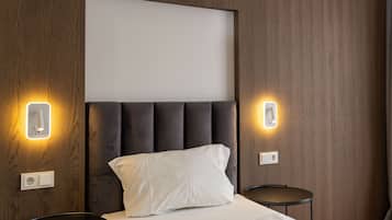Premium bedding, down duvets, minibar, in-room safe