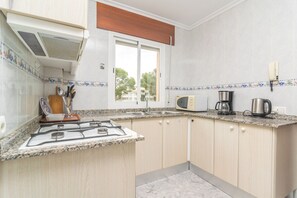 Fridge, microwave, coffee/tea maker, highchair - Casa Manolo - Two Bedroom Apartment, Sleeps 4 (Mallorca)
