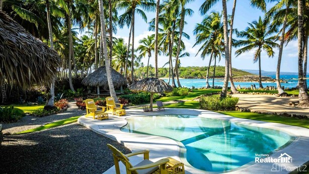 A resort with a swimming pool, palm trees, and a view of the ocean. - Casa Taina- 5 Bungalows, swimming pool- OCEANFRONT w/Butler and Chef (Cabrera María Trinidad)