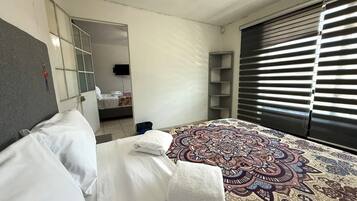 4 habitaciones, tabla de planchar con plancha y wifi gratis