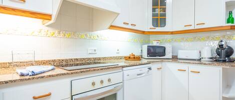 Fridge, microwave, dishwasher, coffee/tea maker