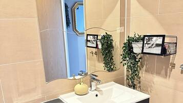 Hair dryer, towels, soap, shampoo