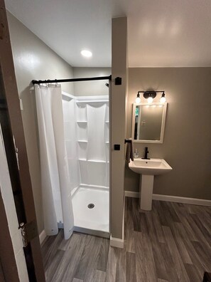 Shower, towels, soap, shampoo