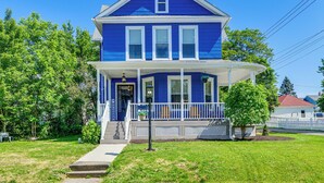 A two-story house with a porch, a front door, and a small front yard. - Pet-Friendly Lancaster Home 13 Mi to Dtwn Buffalo (Lancaster)