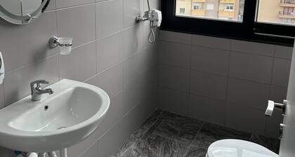 Modern downtown room with private bathroom. Pets allowed.