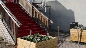 A building with a staircase leading to a door marked "HOTEL SALEM." - Hotell Salem (Ronninge)