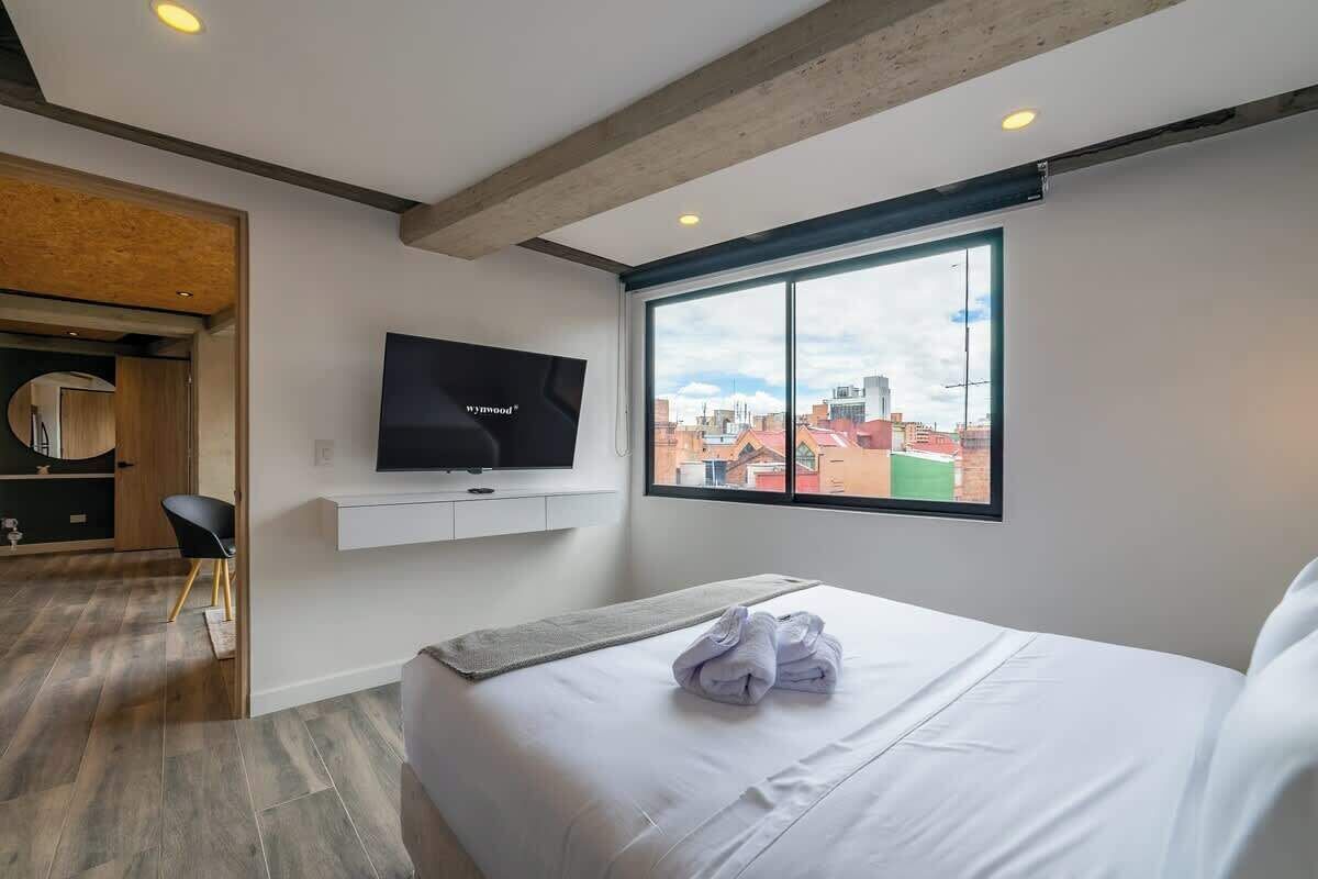 1 habitación, tabla de planchar con plancha, wifi y ropa de cama 