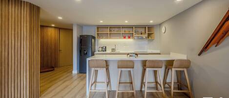 Fridge, microwave, stovetop, coffee/tea maker