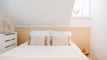 3 slaapkamers, een strijkplank/strijkijzer, reisbedje, wifi