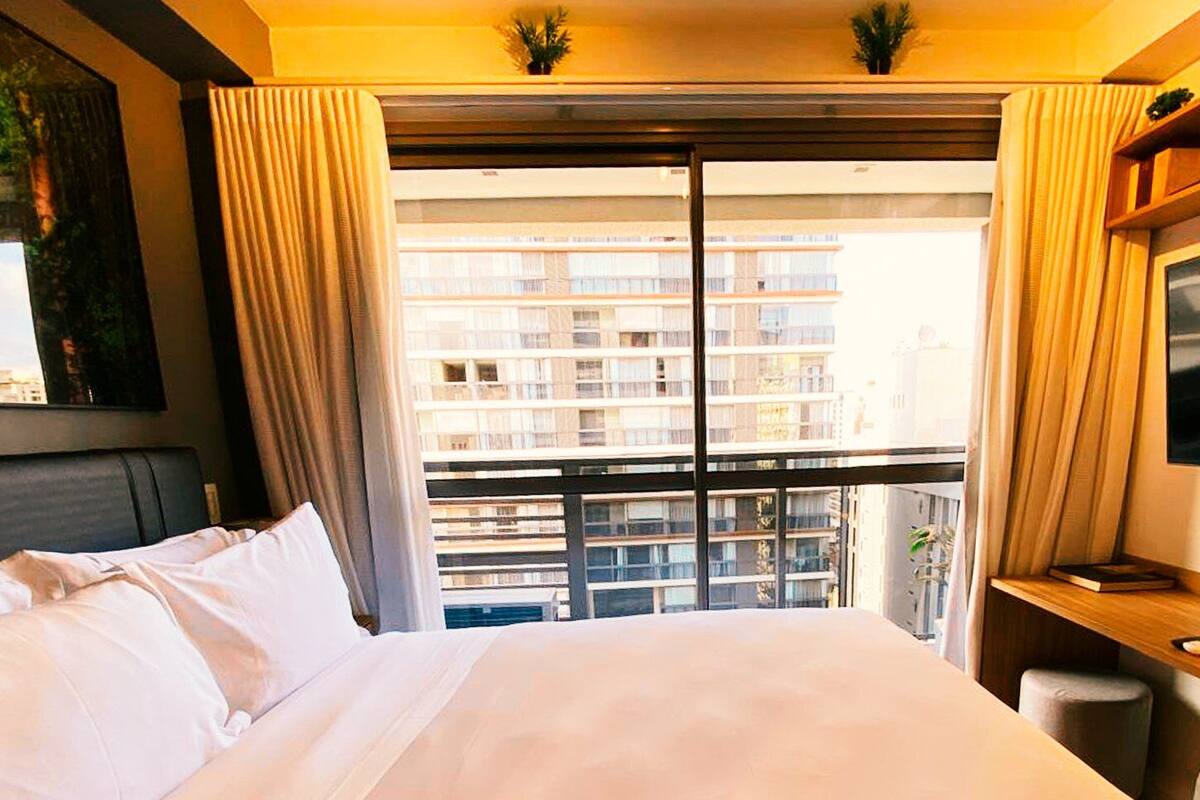 Estúdio Superluxo | Laptop workspace, blackout curtains, iron/ironing board, free WiFi