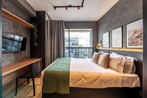 Laptop workspace, blackout curtains, iron/ironing board, free WiFi - Movinn Nine - Jardim Paulista (São Paulo)
