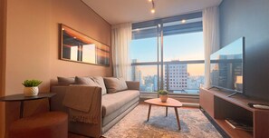 Studio | Living area | Smart TV - Movinn Nine - Jardim Paulista (São Paulo)