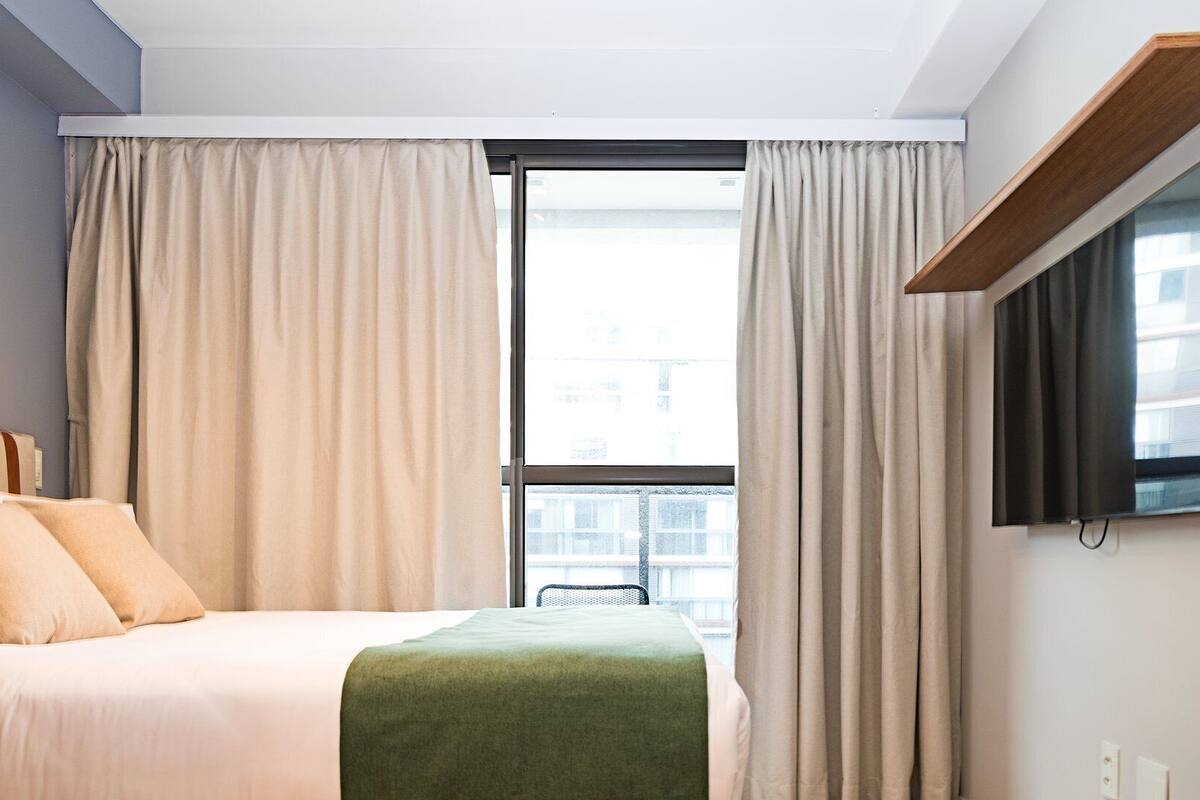 Apartamento Fámilia | Laptop workspace, blackout curtains, iron/ironing board, free WiFi