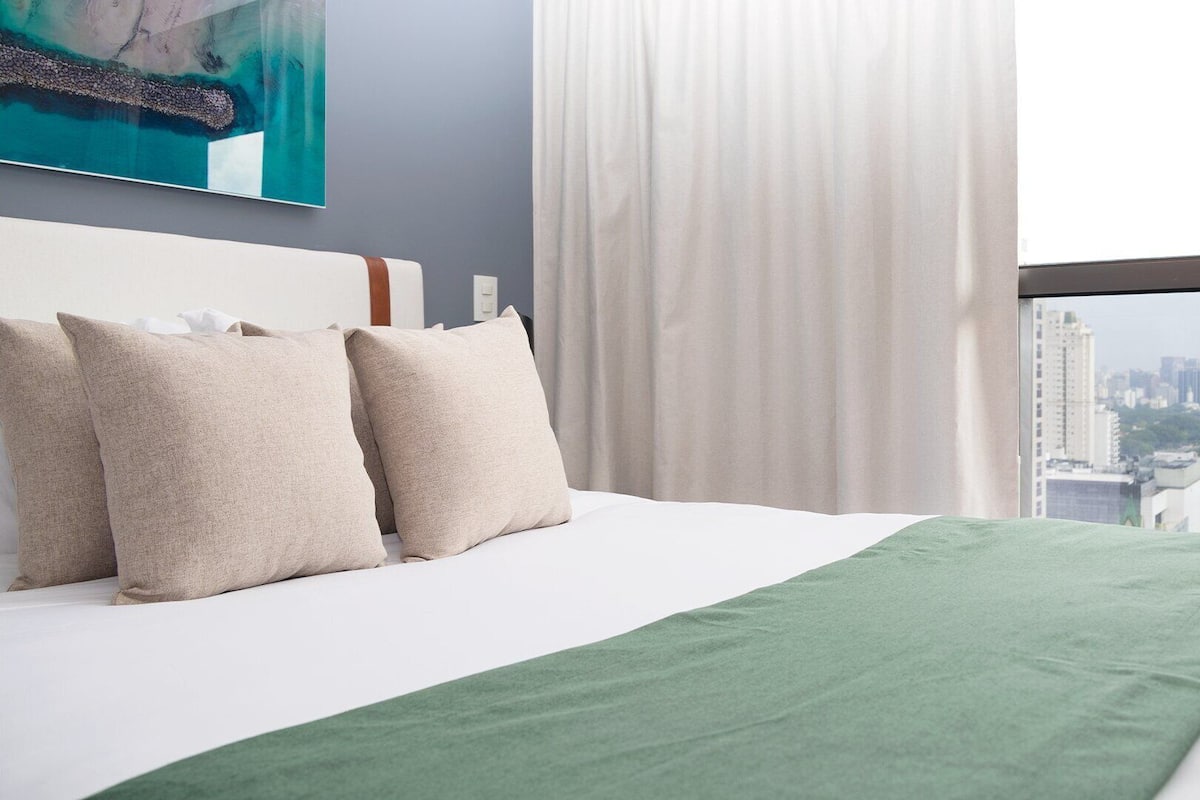 Business Apartment | Laptop workspace, blackout drapes, iron/ironing board, free WiFi