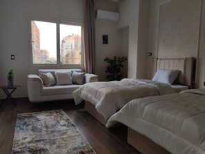 2 habitaciones, tabla de planchar con plancha, wifi y ropa de cama 