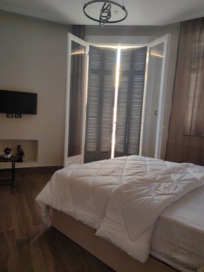2 habitaciones, tabla de planchar con plancha, wifi y ropa de cama 