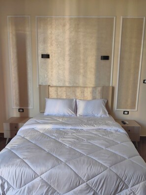2 habitaciones, tabla de planchar con plancha, wifi y ropa de cama 
