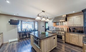 Fridge, oven, dishwasher, dining tables