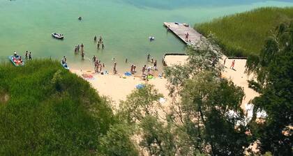 Joli chalet Ă ZeĆwÄ
gi prĂšs du lac