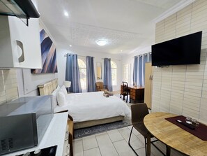 Iron/ironing board, Internet, bed sheets - Kairos Suite Waterfall City Premium Corporate Accommodation Midrand & Sandton. (Sandton)