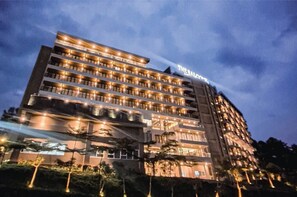 A multi-story hotel with balconies and a sign that reads "The Balcon". - The Balcone Suites & Resort (Gadut)