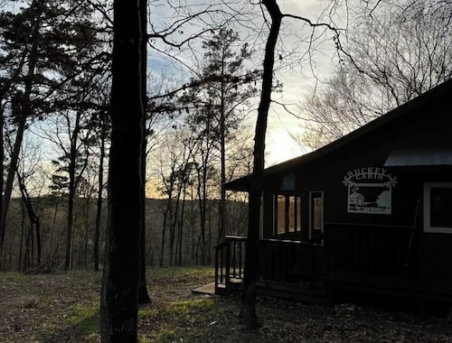 Buckeye cabin is nestled in the woods with access to the Little Missouri River.