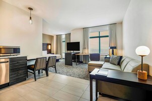 Studio, 1 King Bed with Sofa bed | Living area | 55-inch Smart TV with satellite channels, Netflix, Hulu