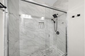 Shower, hair dryer, towels, soap