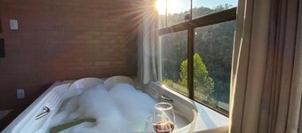 Chalé Aconchegante no Circuito Caravaggio com Hidromassagem Vista das Montanhas