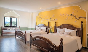 Basic Quadruple Room | Premium bedding, in-room safe, desk, blackout drapes - Charlie Mansion Dalat (Da Lat)