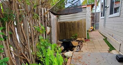 Beach Surfer Bungalow 16 blocks from beach, pool and private yard and patio
