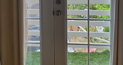 Beach Surfer Bungalow 16 blocks from beach, pool and private yard and patio