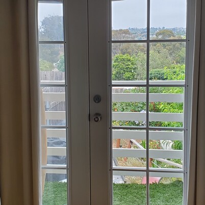 Beach Surfer Bungalow 16 blocks from beach, pool and private yard and patio