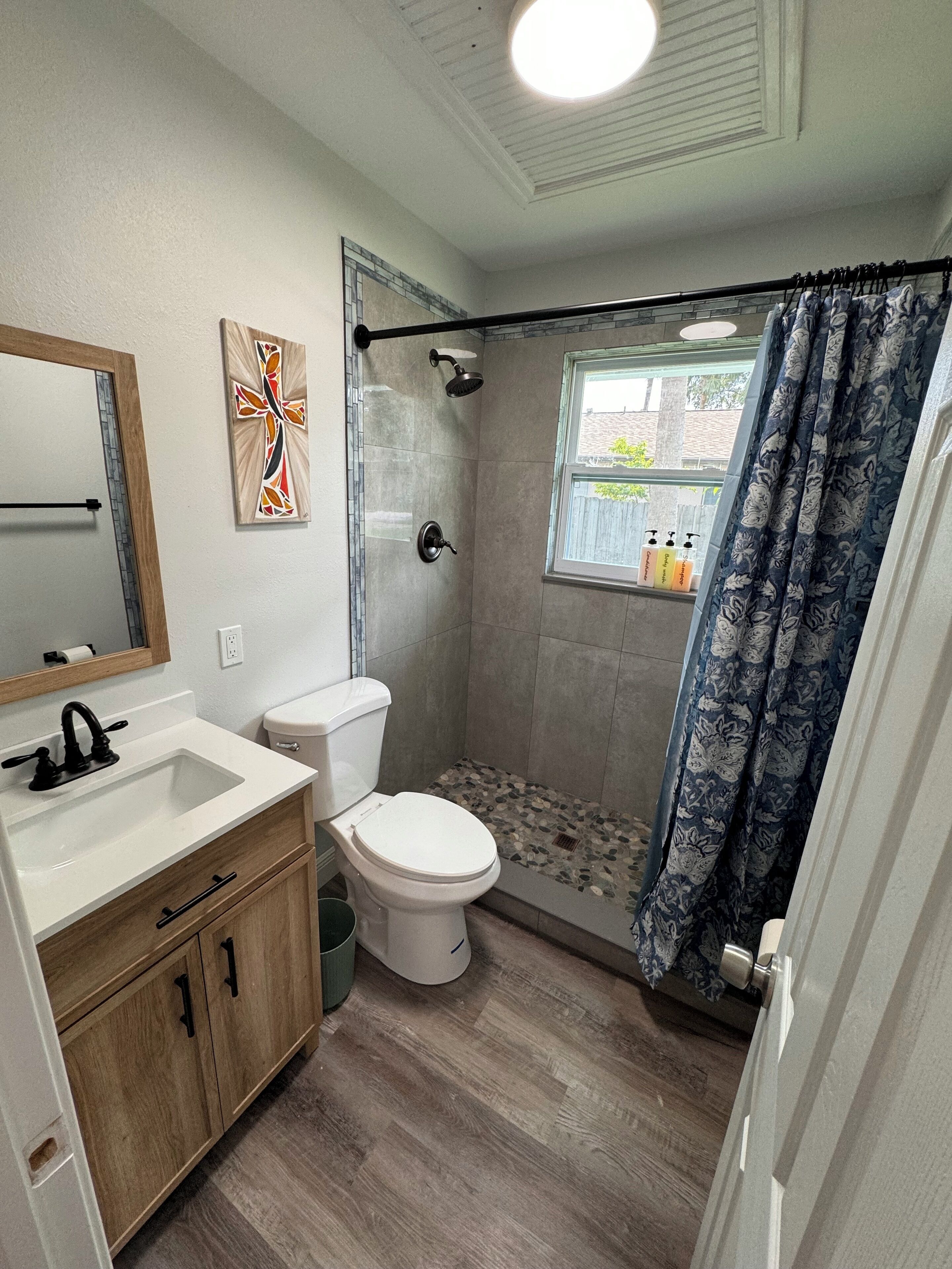 Shower, hair dryer, towels, soap