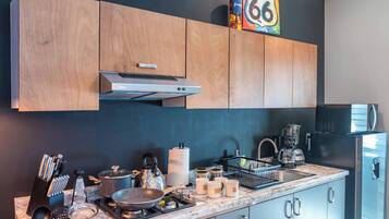 Fridge, microwave, stovetop, coffee/tea maker
