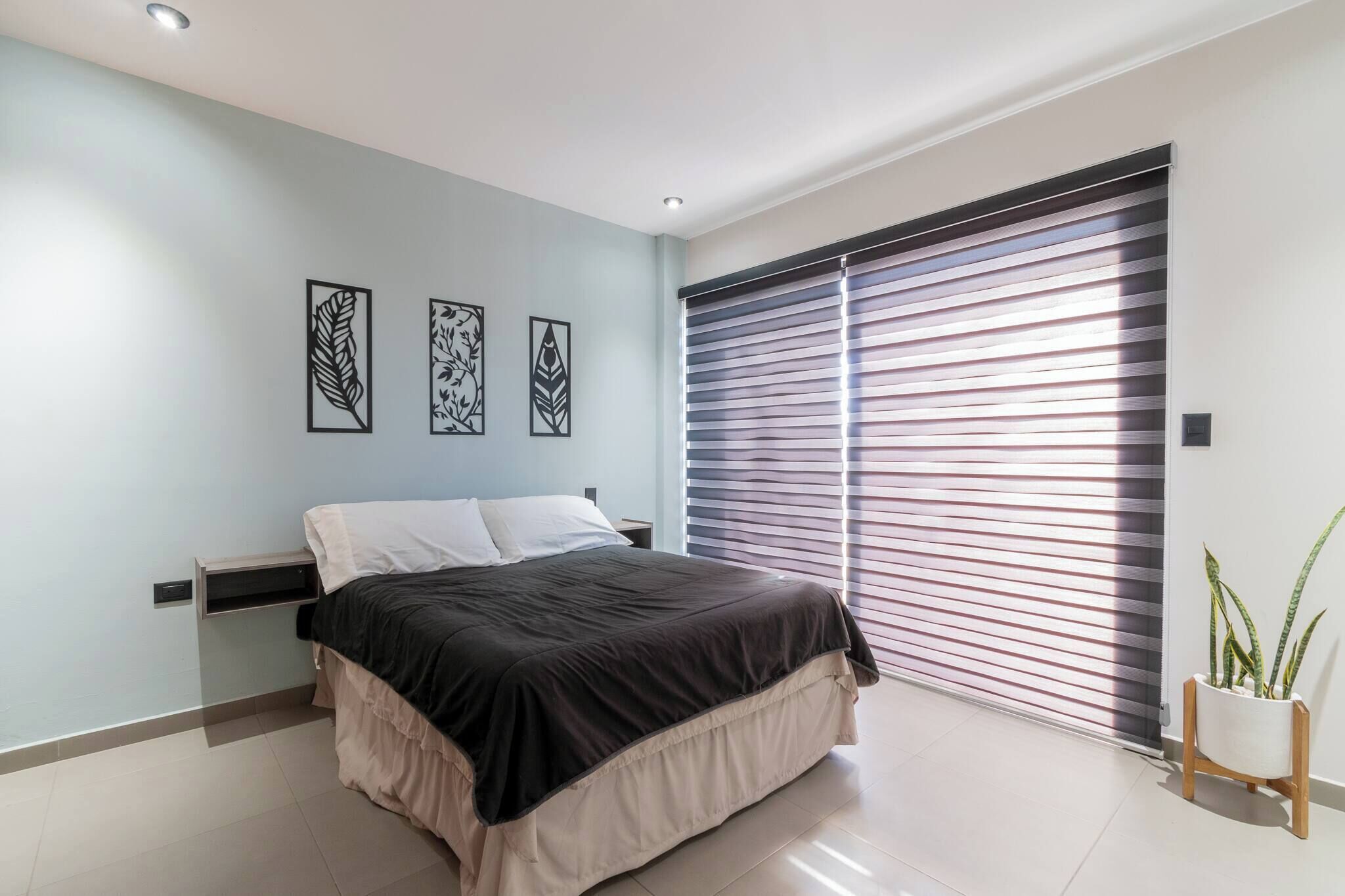 2 dormitorios, tabla de planchar con plancha, wifi gratis y ropa de cama